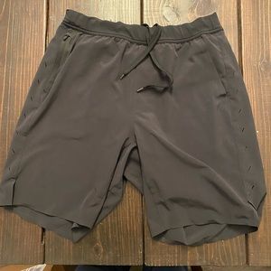 Ten Thousand Interval Shorts with liner. 9”. Black. Size L